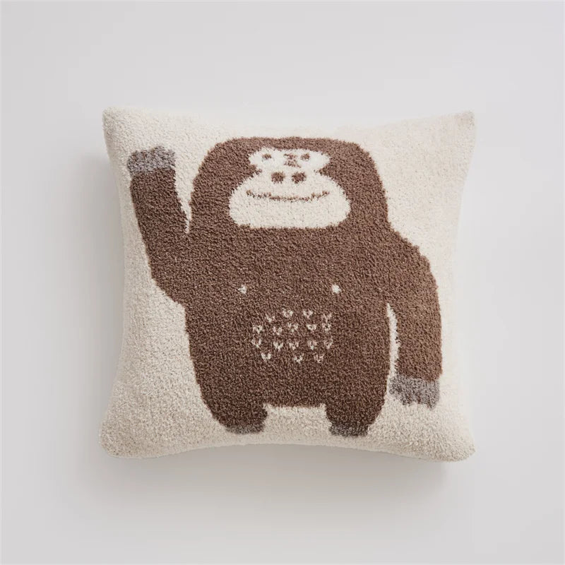 Cream Kawaii Gorilla square pillow with a waving brown gorilla on a white background