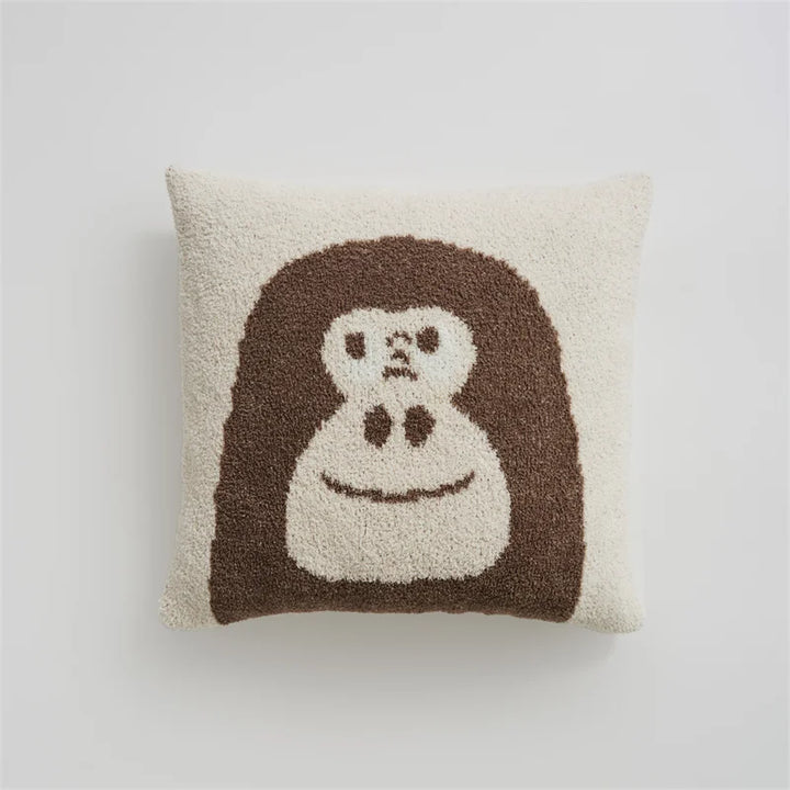 Cream Kawaii Gorilla square pillow with a large brown gorilla face on a white background