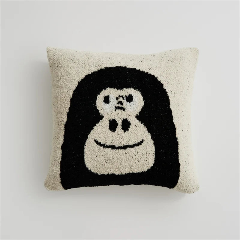 Cream Kawaii Gorilla square pillow with a large black gorilla face on a white background