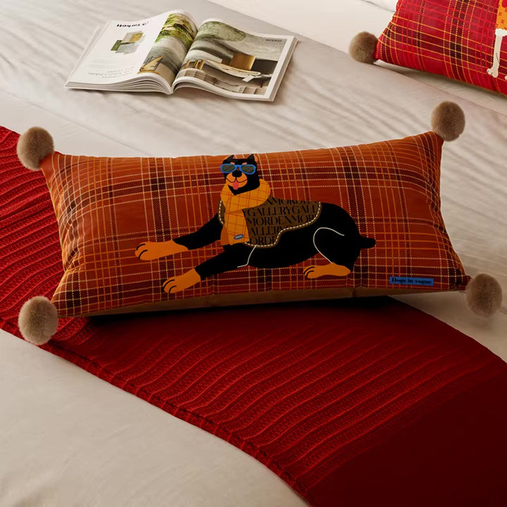 Brown plaid lumbar dog pillow with a Doberman illustration and pom-pom corners