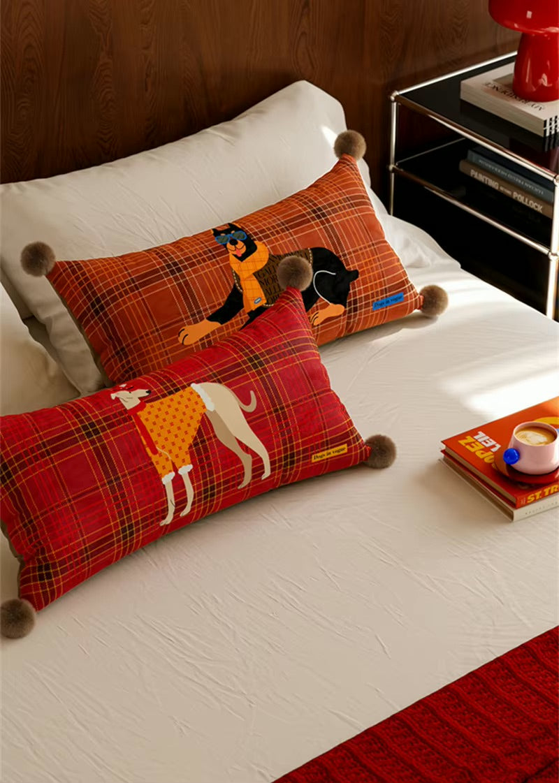 Rectangular rust and red plaid dog pillows with Doberman and greyhound prints