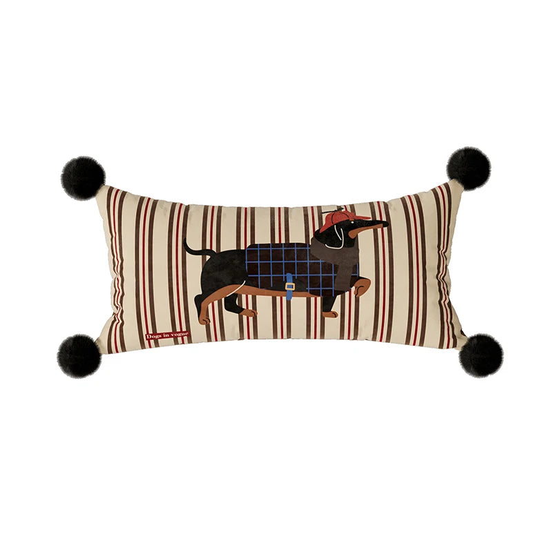 Striped lumbar pillow with a black dog print and four black pom-pom corners