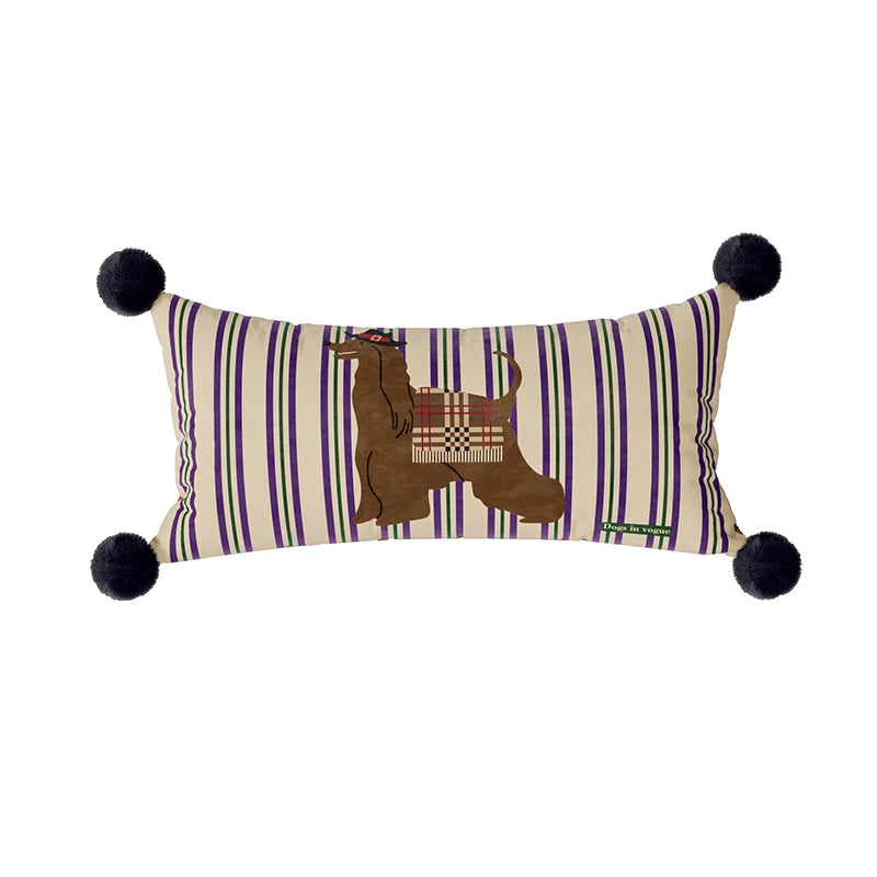 Striped lumbar pillow with a brown dog print and four black pom-pom corners
