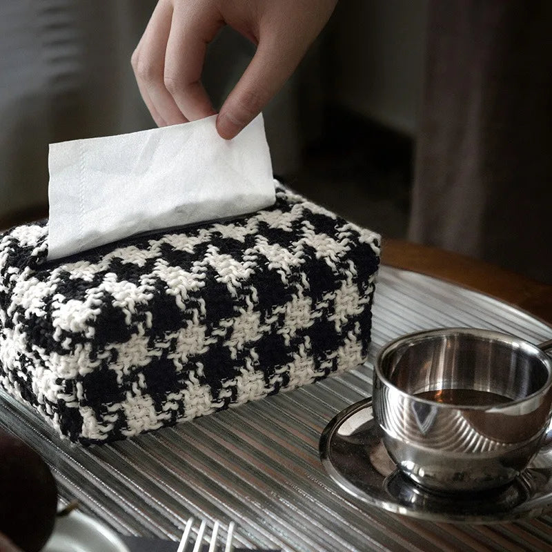Woven square tissue holder with a black and white textured pattern
