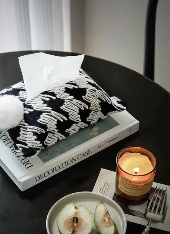 Woven tissue holder with white bunny tail pom-pom and black-and-white squiggle pattern