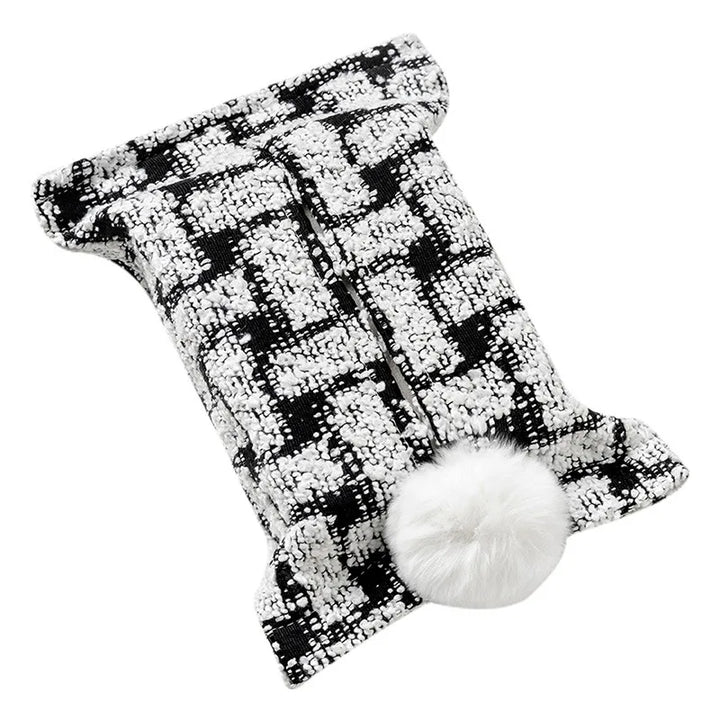 Black and white textured plaid tissue pouch with a white bunny-tail pom-pom.